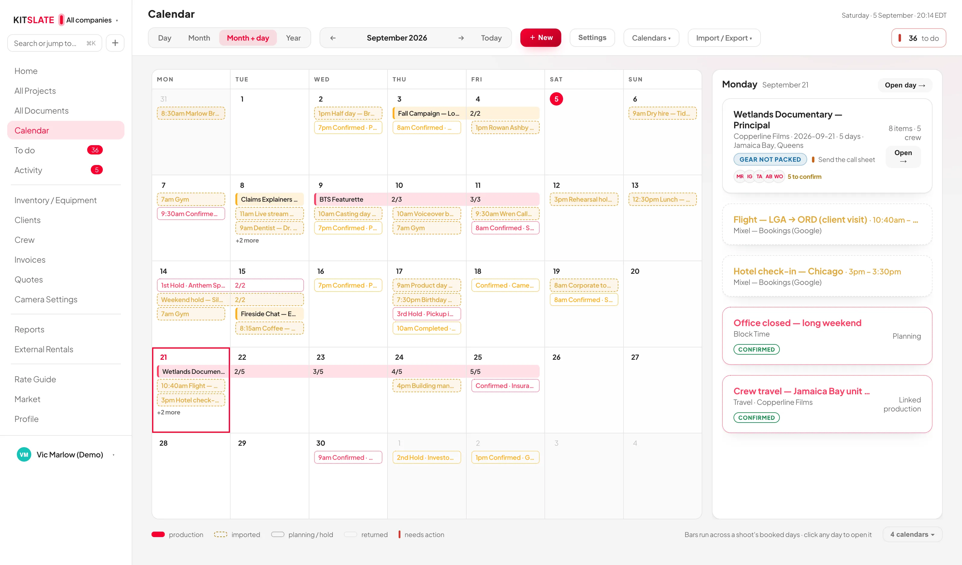 The KitSlate month-and-day view: the month grid with a single day opened in a panel beside it